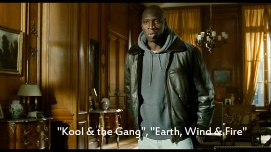 Arbeidsintervju: Philippe spør om Driss har referanser. Driss refererer til musikkgrupper. «De Urørlige» Rettigheter: Quad Productions