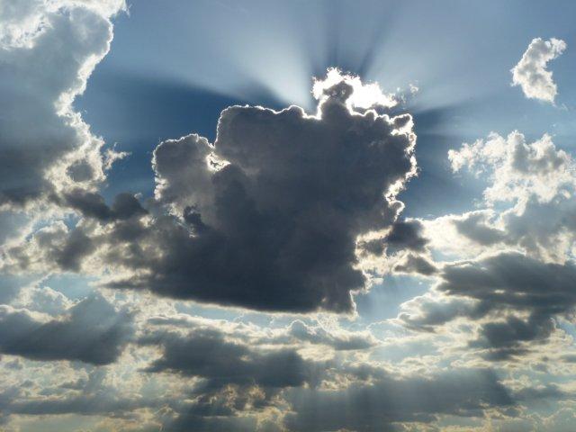 Setting-sun-behind-rain-cloud